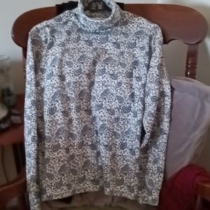 Woman long sleeve blue paisley pattern turtle neck. Comfy gentley worn cotton